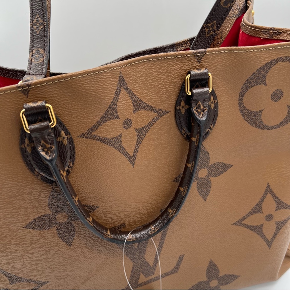 Louis Vuitton Brown Monogram Tote with Red Interior. - Picture 9 of 16
